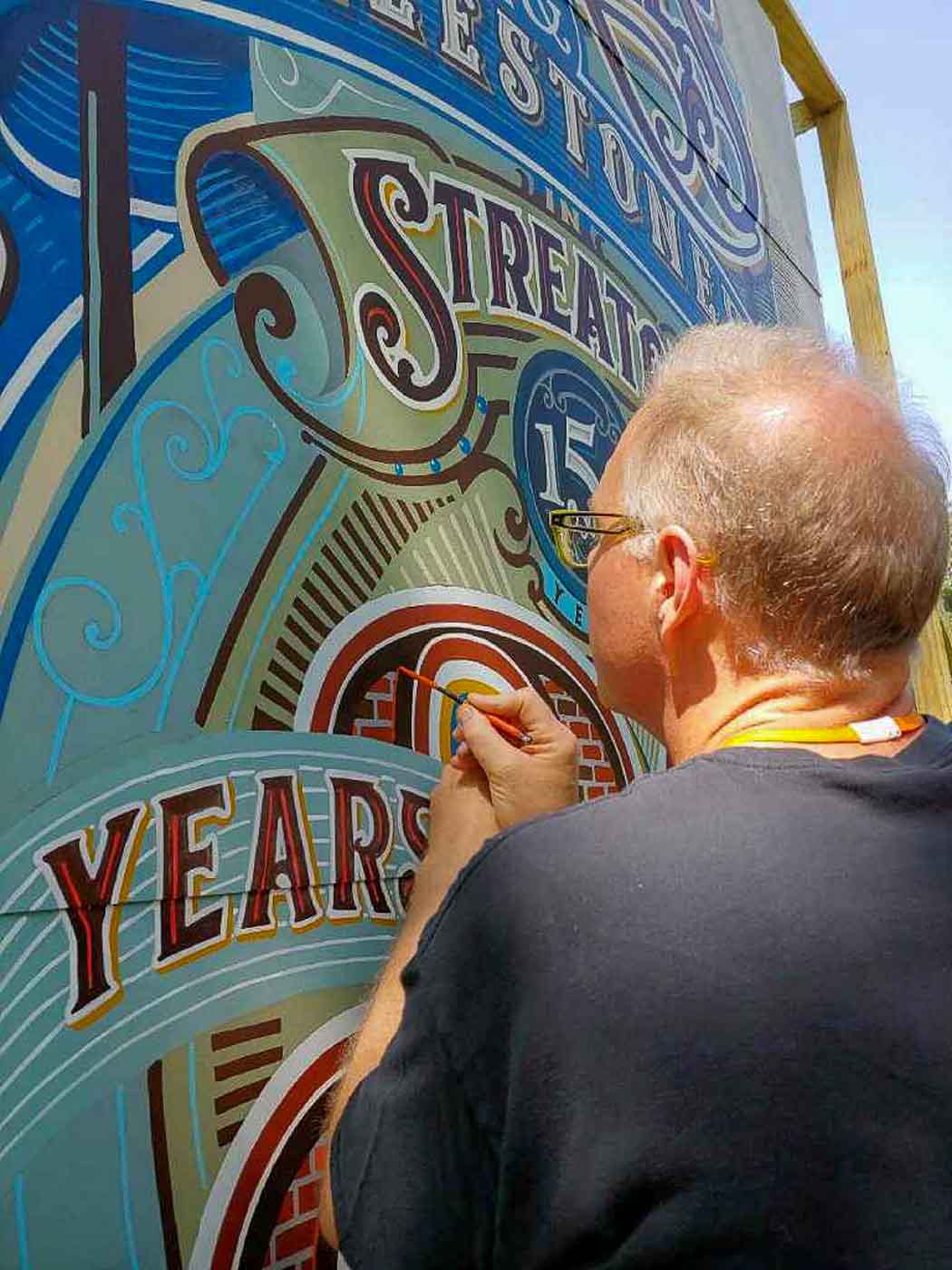 Jeff painting with the Streator Illinois Wall Dogs